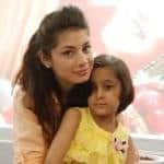 Sidra Batool with little girl