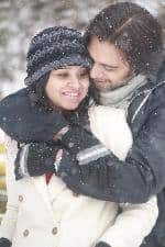 Imran Aslam with wife in snow fal