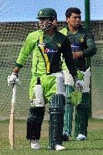 Kamran Akmal and Umar Akmal in the net at Mirpur