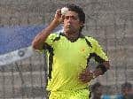 Mohammad Sami bowls during a practice match.jpg