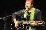 Salman Ahmad plays his guitar for UMKC s