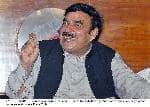 Sh-Rasheed_ gestures as he speaks during a press conference at lahore