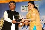 TV Anchor Asma chaudhry receives her award during the ceremony